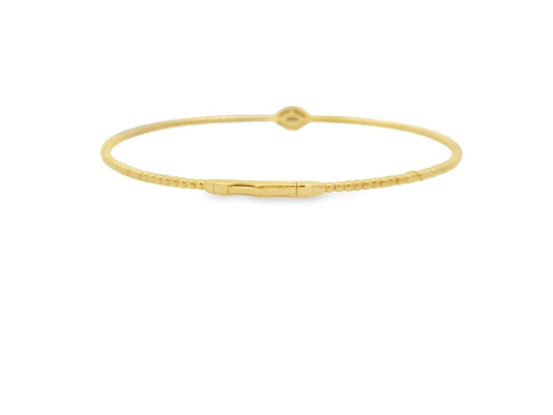 14K Yellow Gold Diamond Eye Flexible Bangle Bracelet

This stylish bangle bracelet features .07ctw of natural diamonds set in 14K yellow gold, creating a sleek and flexible design that adds a subtle sparkle to any look.